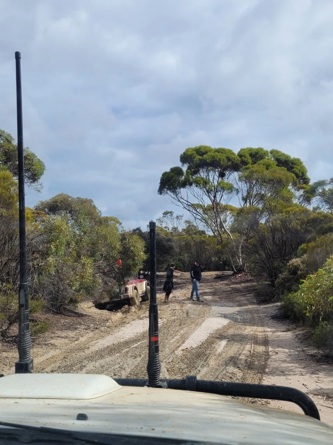 Teams out of the vehicle on course in the Wimmera mallee