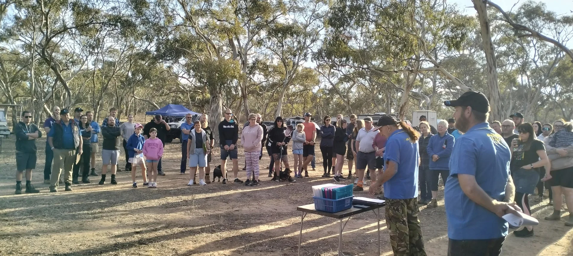 Morning briefing — competitors gathered in the mallee for the day's course