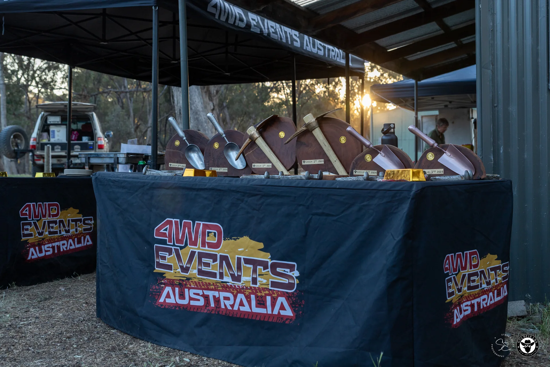 Trophy table at dusk — Amazing Race Goldfields